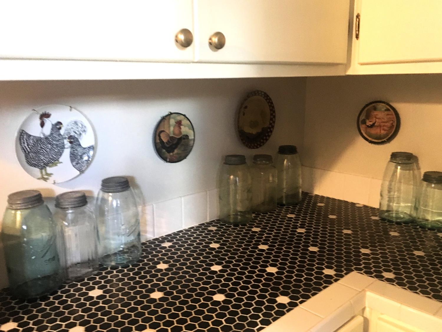 126 Center Street Jackson, CA 95642 - Photo 55 of 79 Lower level dry bar with upper/lower cabinets, adjacent to covered outdoor kitchen area and access to mid level garden via stone paver/gravel pathway