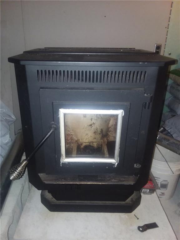 48 Bolton Hill Road Augusta, ME 04330 - Photo 27 of 31 PELLET STOVE IN BASEMENT