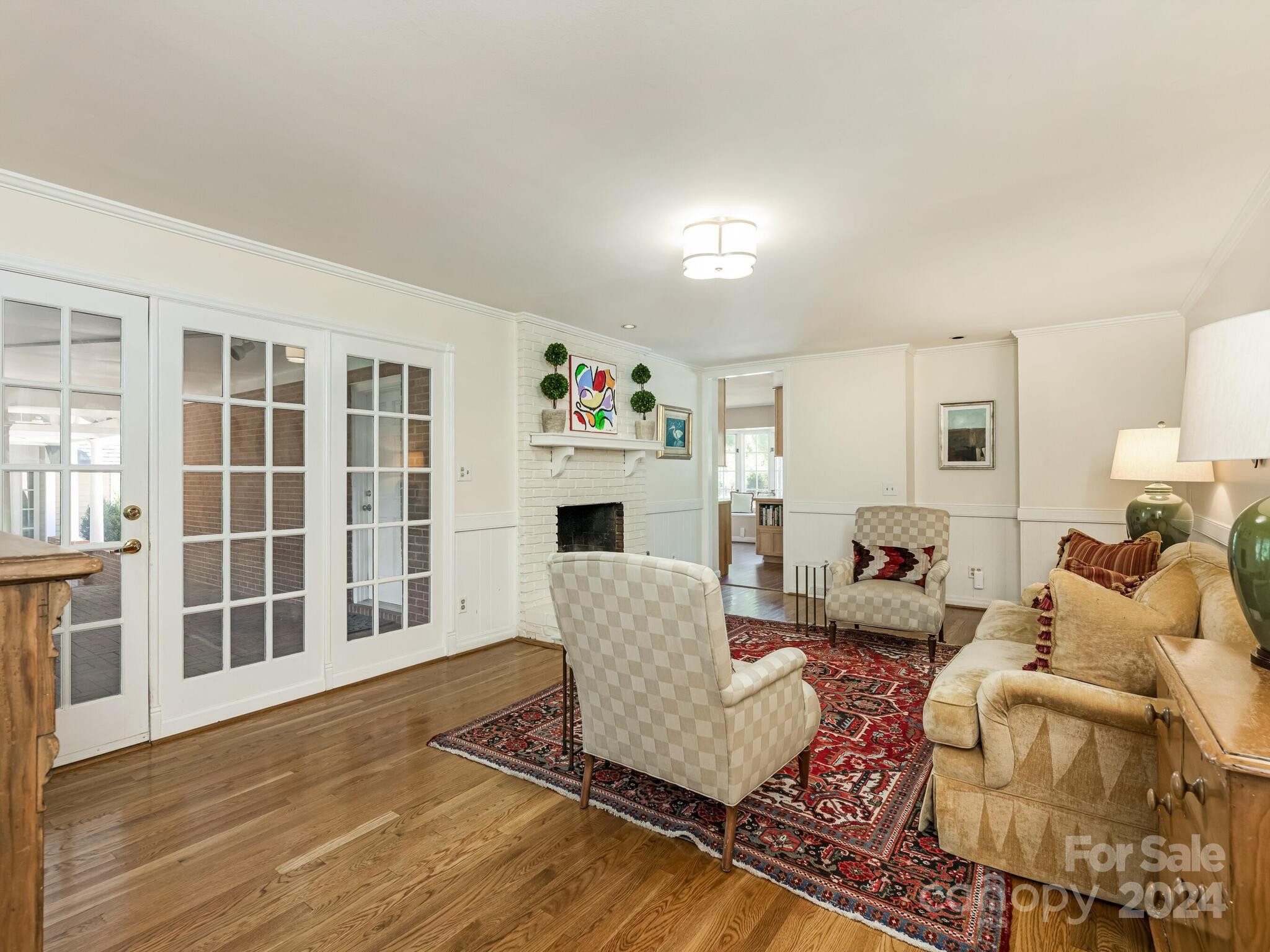 435 Lansdowne Road Charlotte, NC 28270 - Photo 12 of 29 a living room with furniture windows and wooden floor