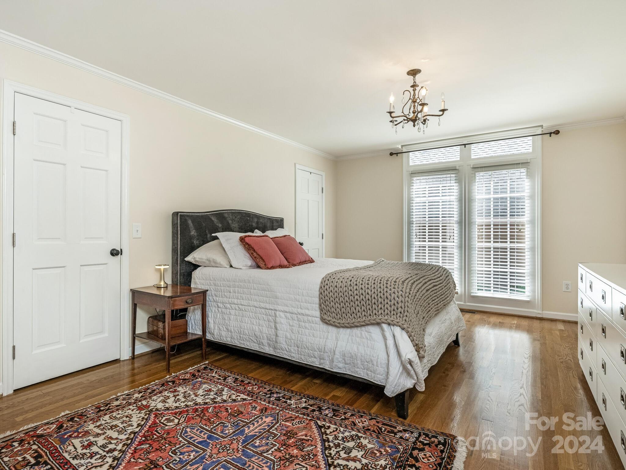 435 Lansdowne Road Charlotte, NC 28270 - Photo 14 of 29 a bedroom with a bed and a window