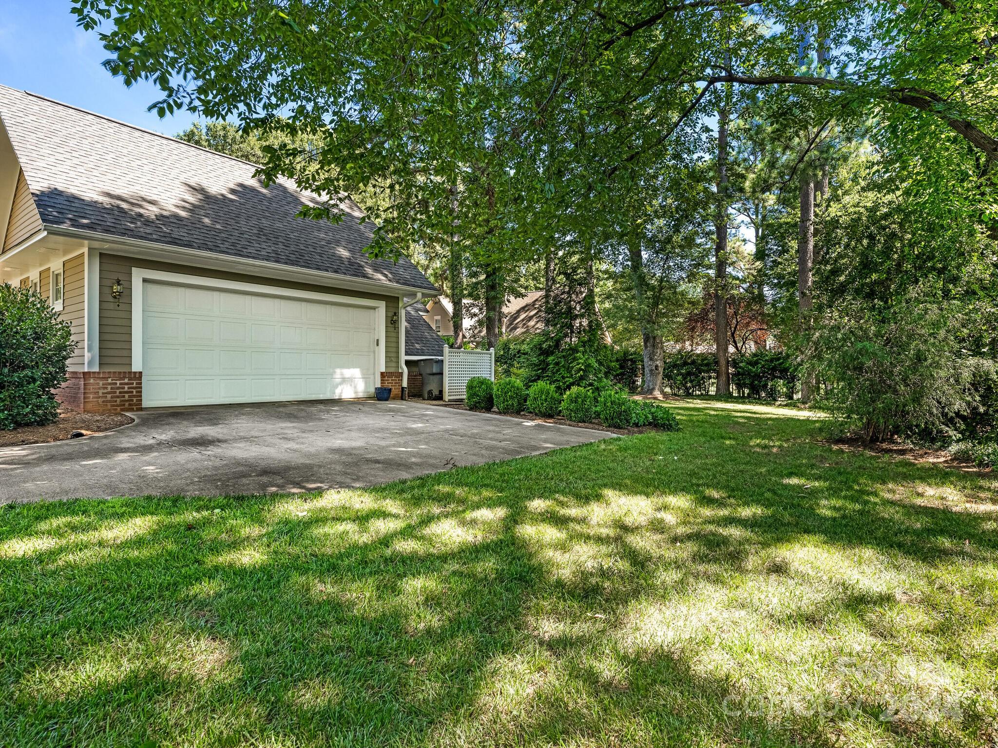 435 Lansdowne Road Charlotte, NC 28270 - Photo 28 of 29 a front view of house with yard and green space