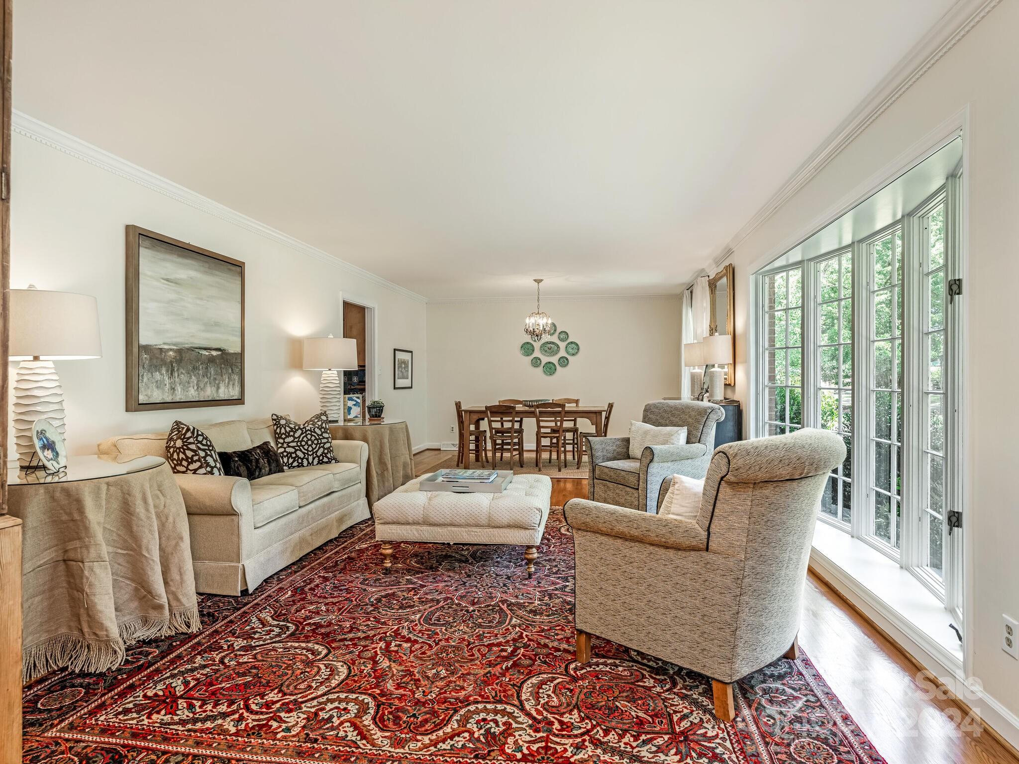 435 Lansdowne Road Charlotte, NC 28270 - Photo 4 of 29 a living room with furniture and a large window