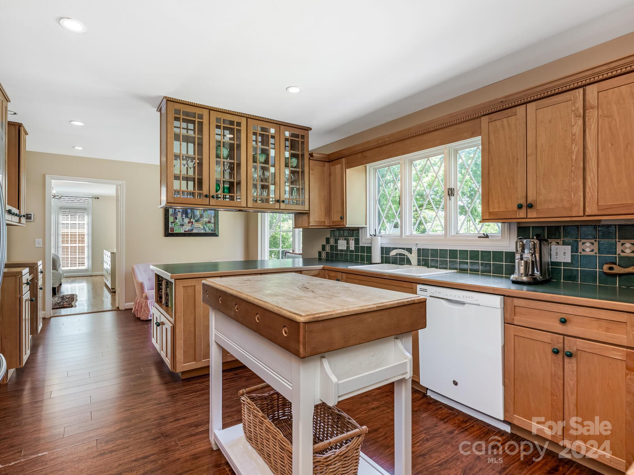 435 Lansdowne Road Charlotte, NC 28270 - Photo 7 of 29 a kitchen with stainless steel appliances granite countertop a stove a sink and a refrigerator