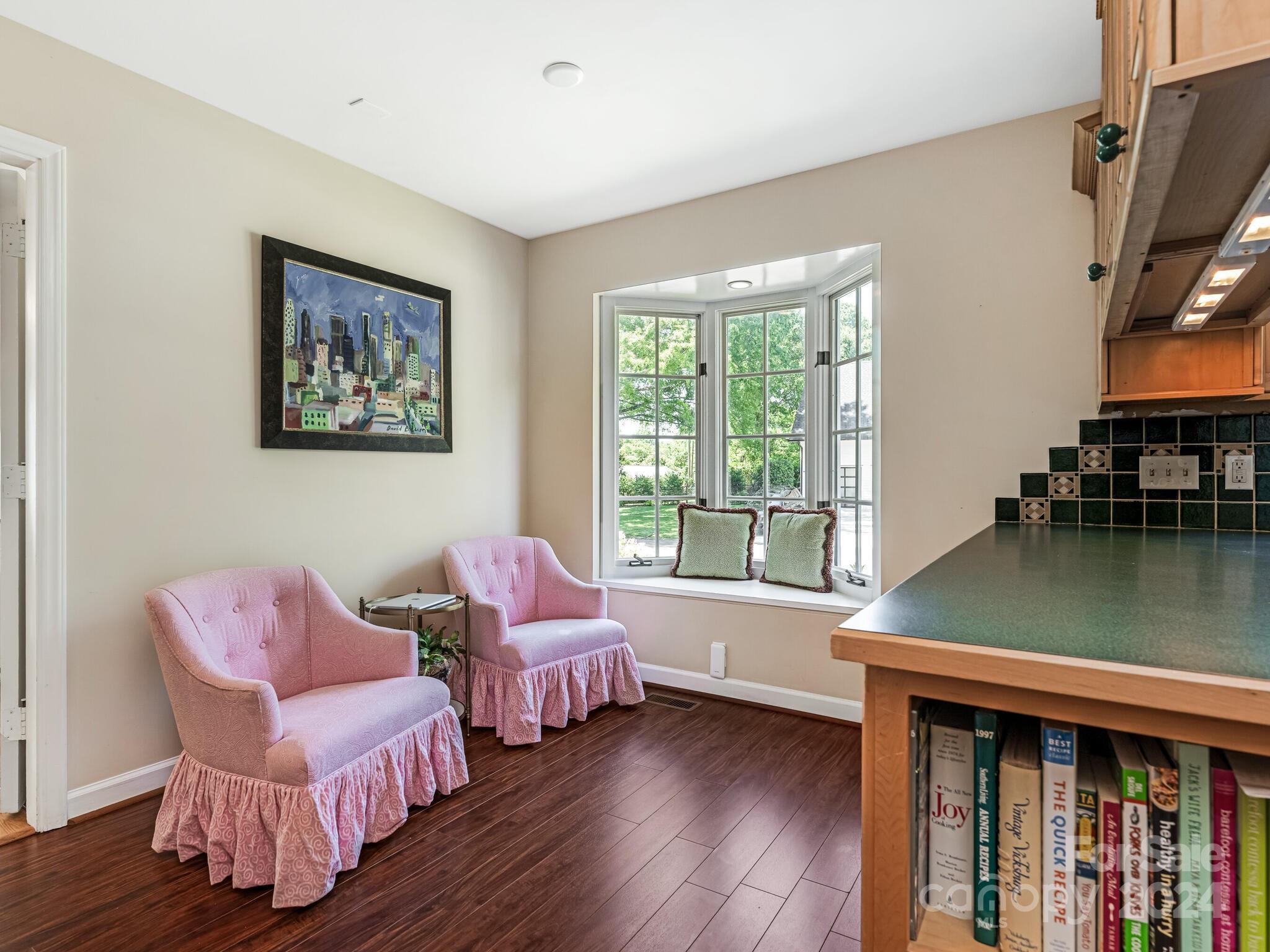 435 Lansdowne Road Charlotte, NC 28270 - Photo 10 of 29 a living room with furniture a window and a flat screen tv
