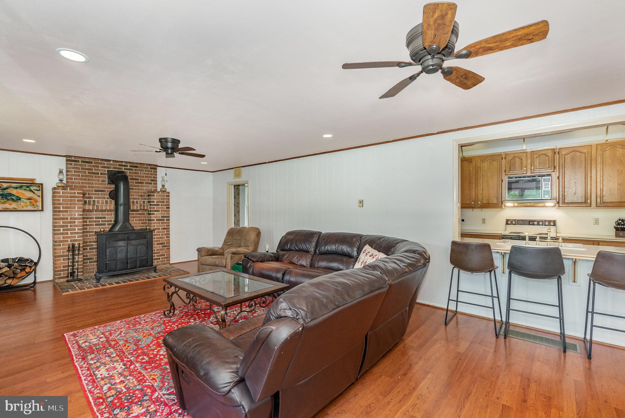 14111 Turners Point Road Kennedyville, MD 21645 - Photo 21 of 54 FAMILY ROOM WITH WOODSTOVE