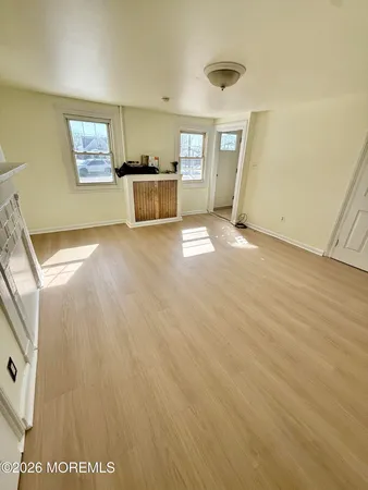a view of a kitchen with a sink cabinets and a window
