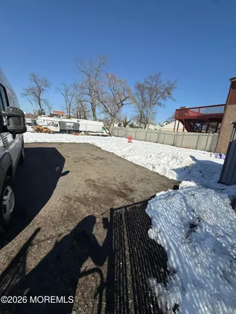 a view of roof deck with patio