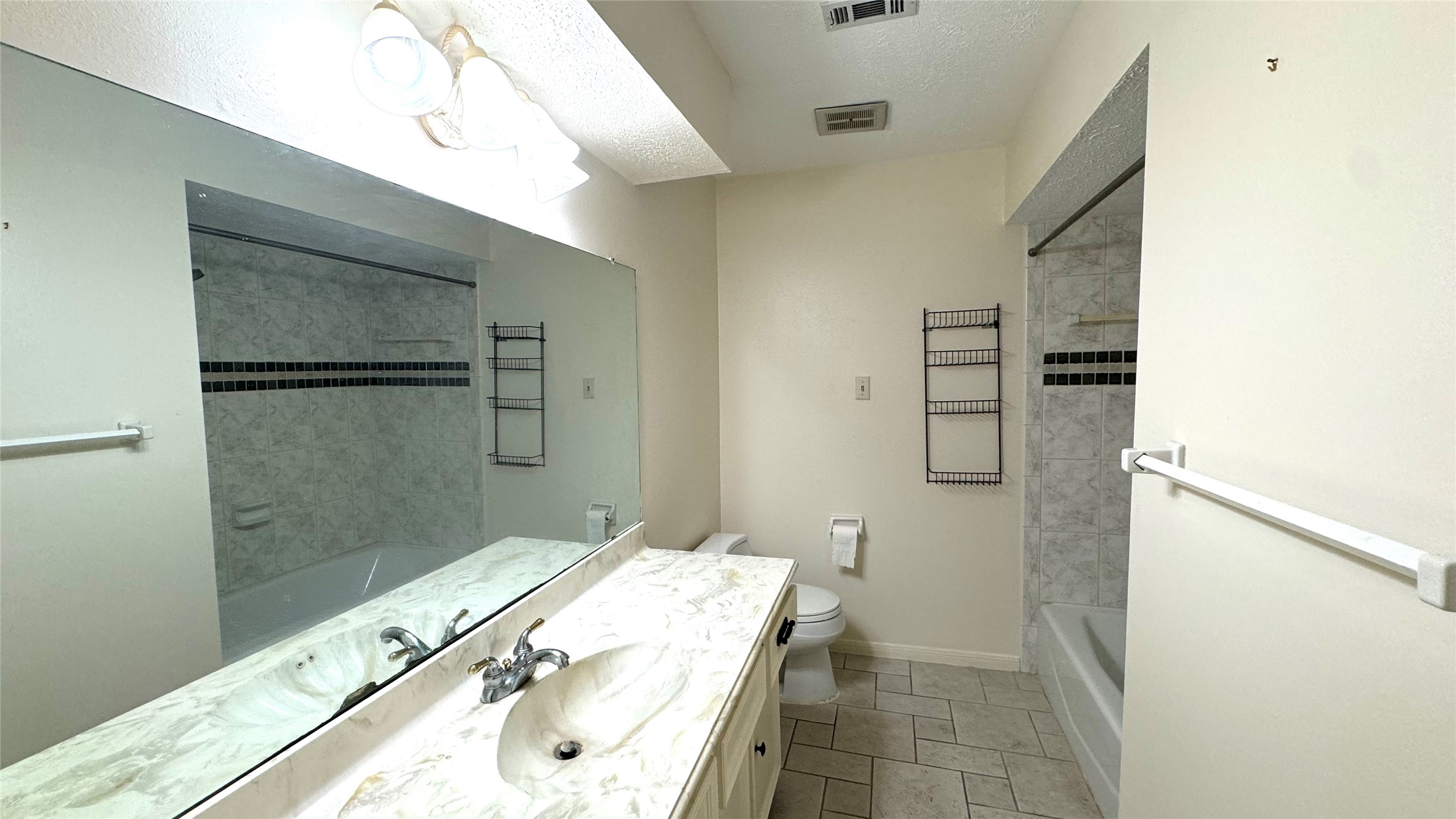 618 Cannon Ball Drive Spring, TX 77380 - Photo 13 of 26 a bathroom with a tub and shower