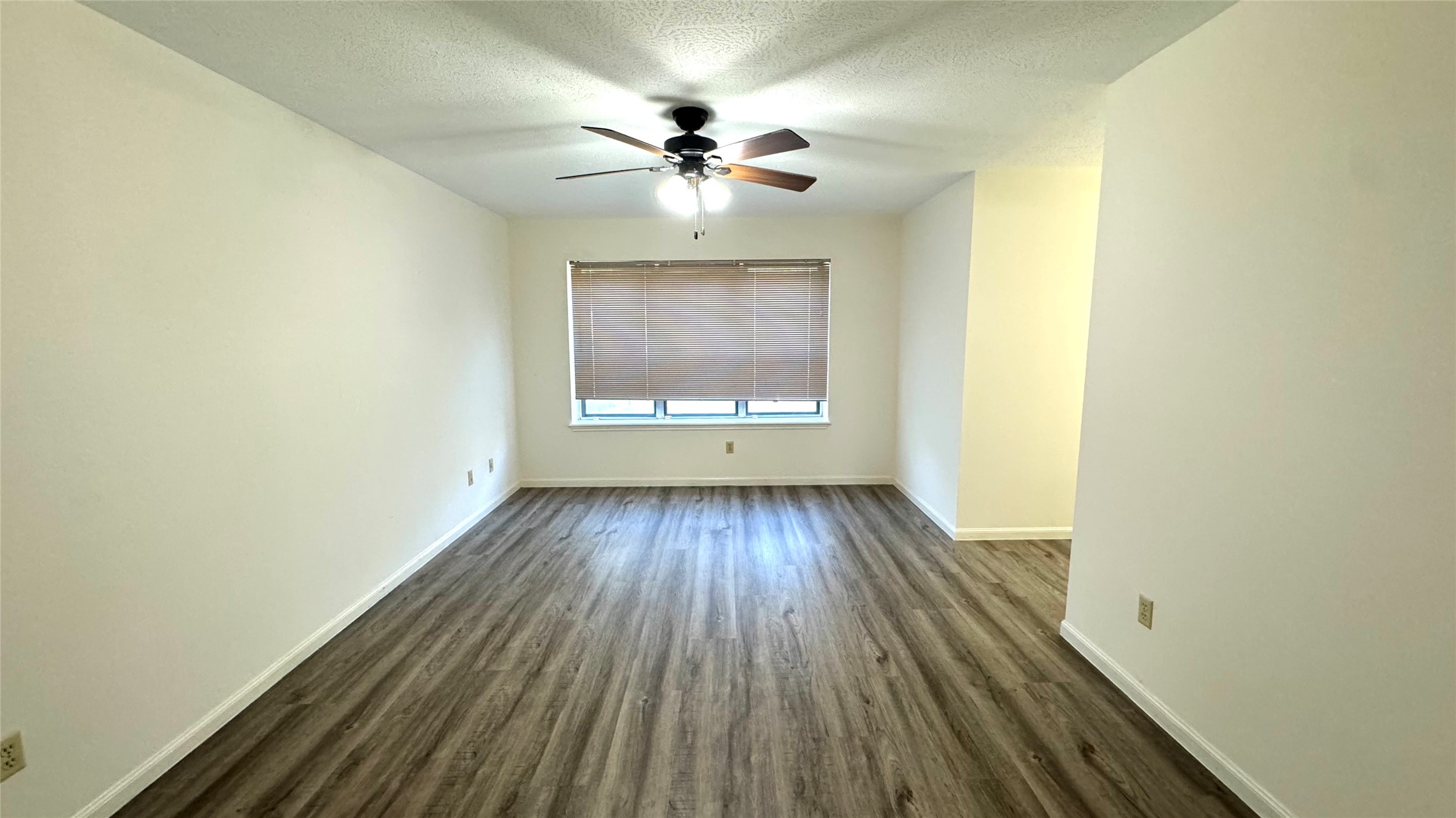 618 Cannon Ball Drive Spring, TX 77380 - Photo 15 of 26 a view of an empty room with wooden floor and a window