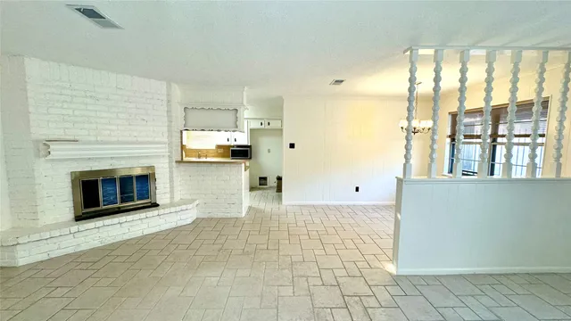 a living room with a fireplace