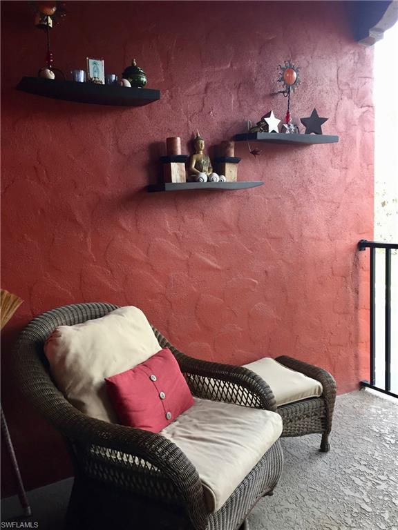 9126 Chula Vista Street, Unit 12301 Naples, FL 34113 - Photo 15 of 36 a bathroom with a sink and a mirror
