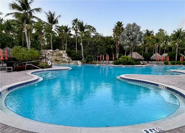 a view of a swimming pool with an outdoor space