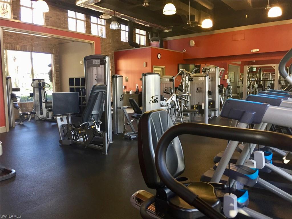 9126 Chula Vista Street, Unit 12301 Naples, FL 34113 - Photo 35 of 36 a view of a room with gym equipment