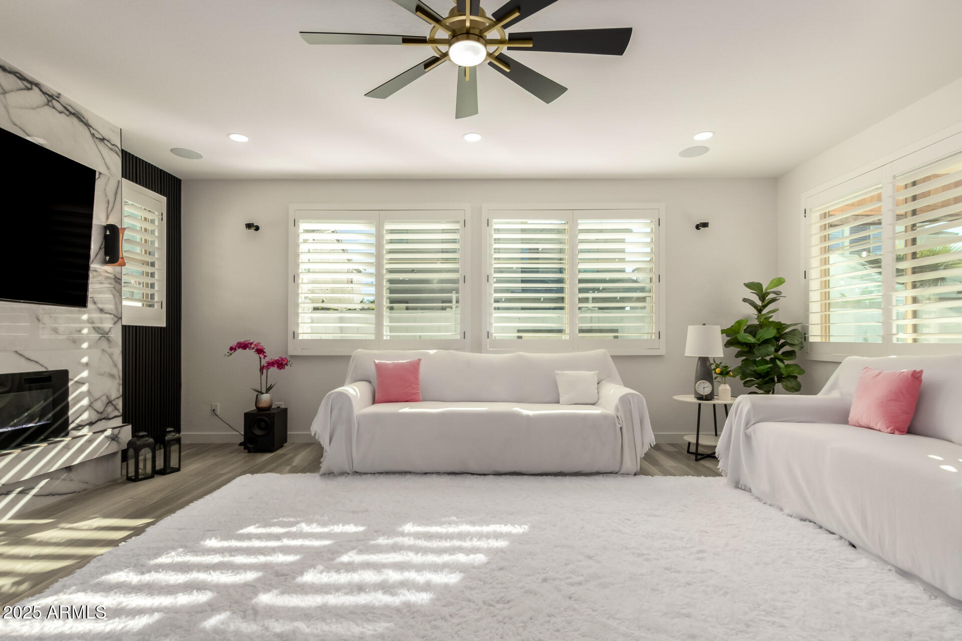 1501 East Rakestraw Lane Gilbert, AZ 85298 - Photo 14 of 71 a living room with furniture and a flat screen tv