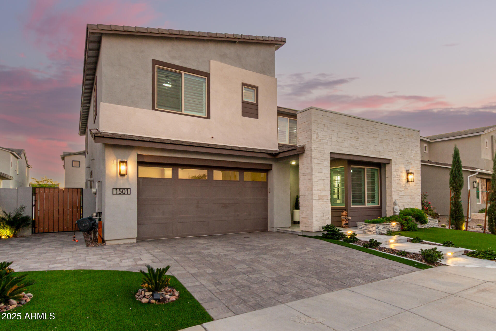 1501 East Rakestraw Lane Gilbert, AZ 85298 - Photo 2 of 71 a front view of a house with garden