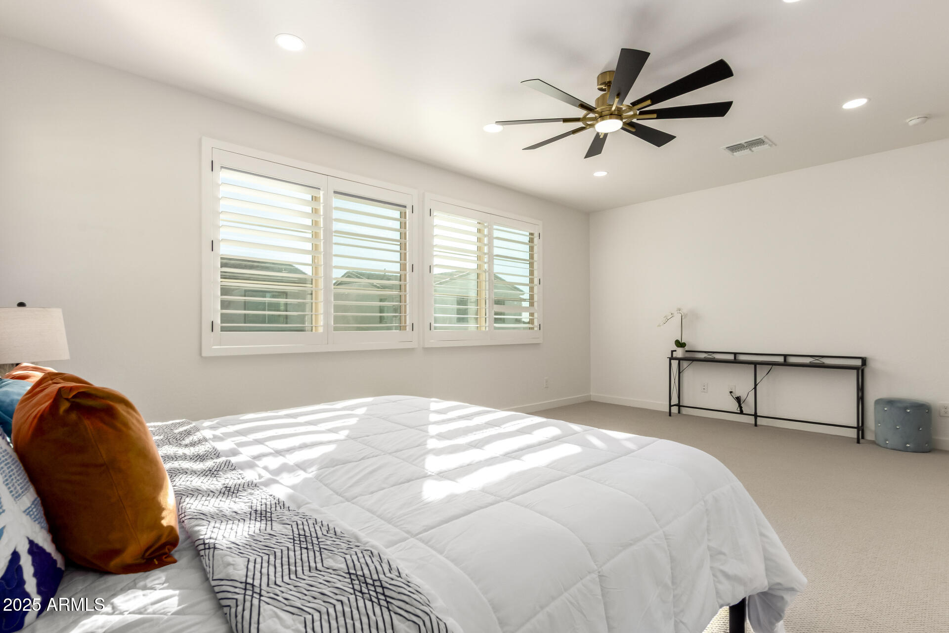 1501 East Rakestraw Lane Gilbert, AZ 85298 - Photo 31 of 71 a bedroom with a bed and window