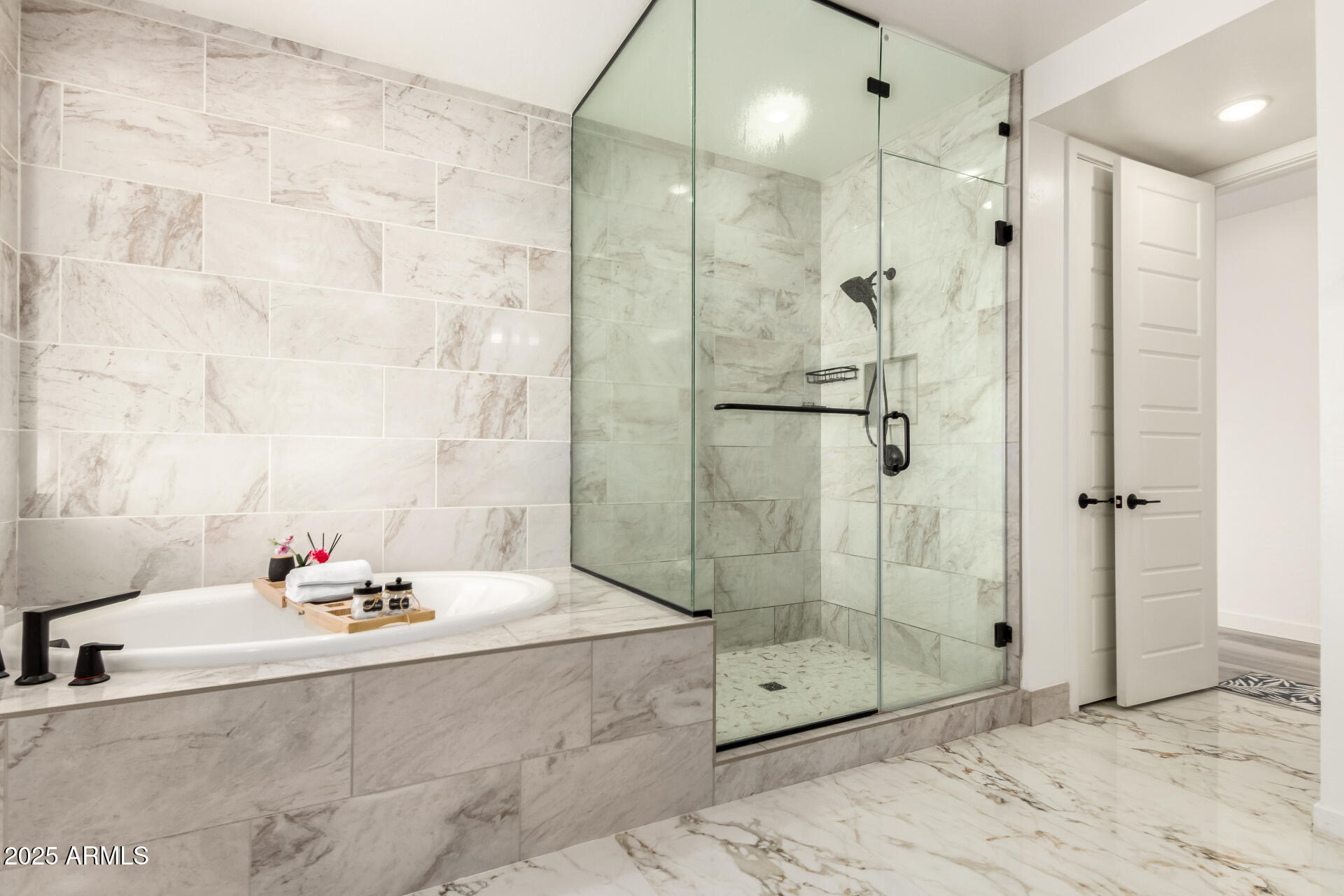 1501 East Rakestraw Lane Gilbert, AZ 85298 - Photo 33 of 71 a bathroom with a tub shower sink and mirror