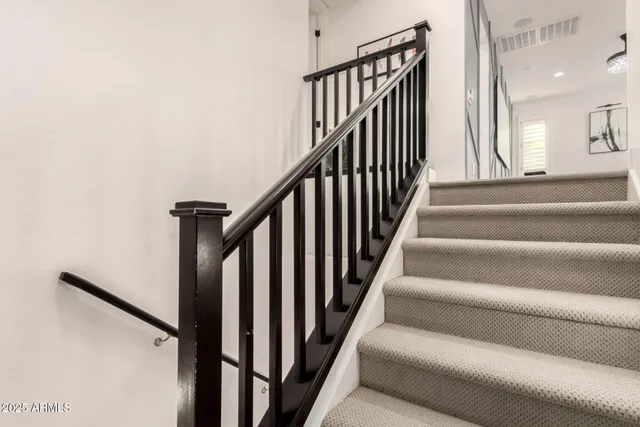 a front view of a house with a yard and porch