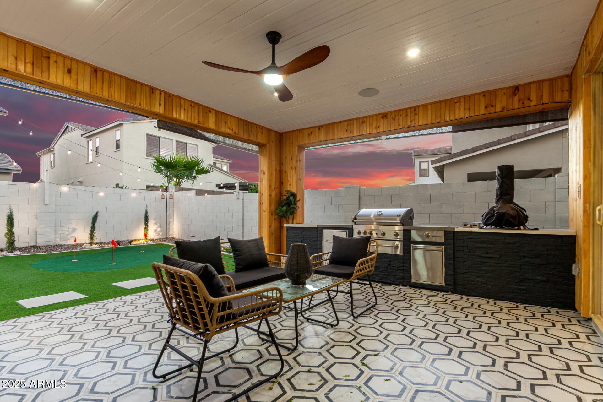 1501 East Rakestraw Lane Gilbert, AZ 85298 - Photo 44 of 71 a living room with patio furniture