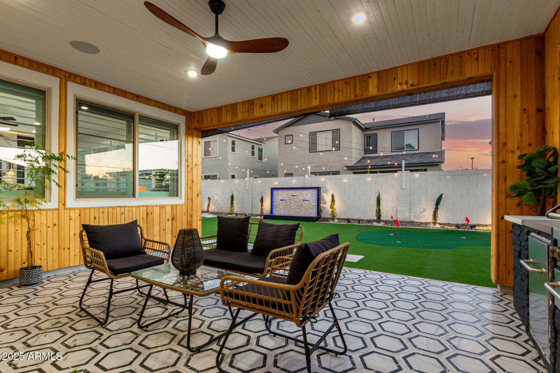 1501 East Rakestraw Lane Gilbert, AZ 85298 - Photo 45 of 71 a outdoor living space with furniture and garden view