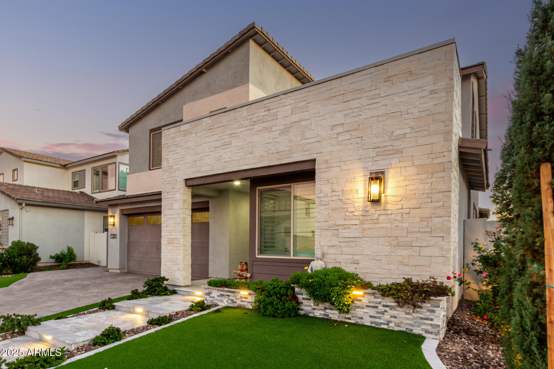 1501 East Rakestraw Lane Gilbert, AZ 85298 - Photo 3 of 71 front view of a house with a yard