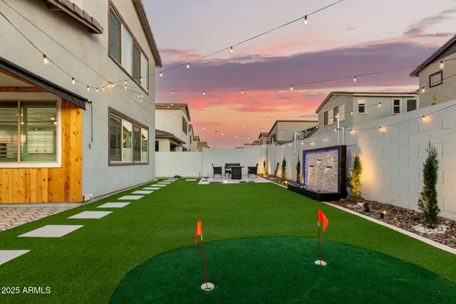 a view of a street with a building in the background