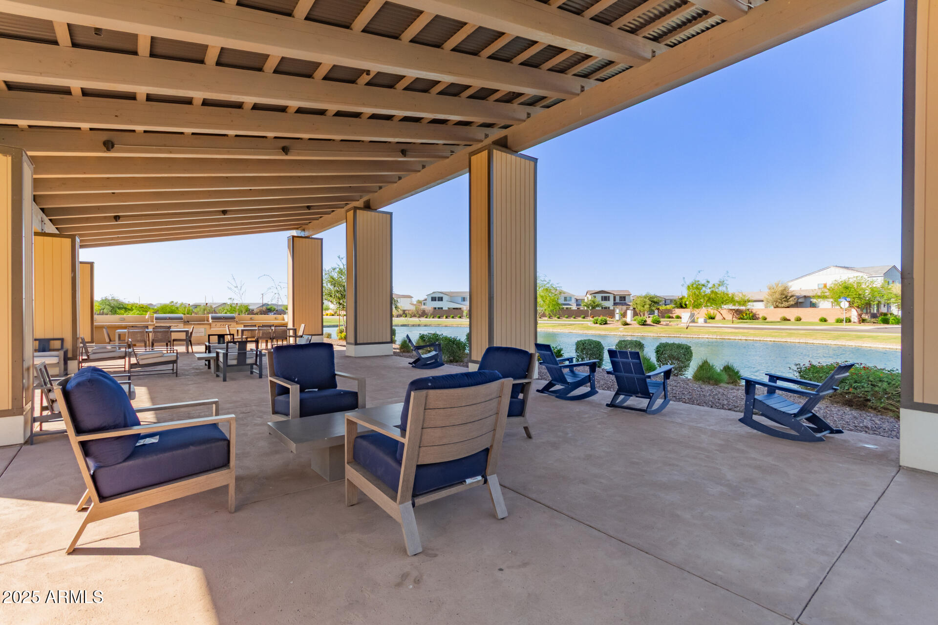 1501 East Rakestraw Lane Gilbert, AZ 85298 - Photo 67 of 71 a building outdoor space with patio furniture and a potted plant