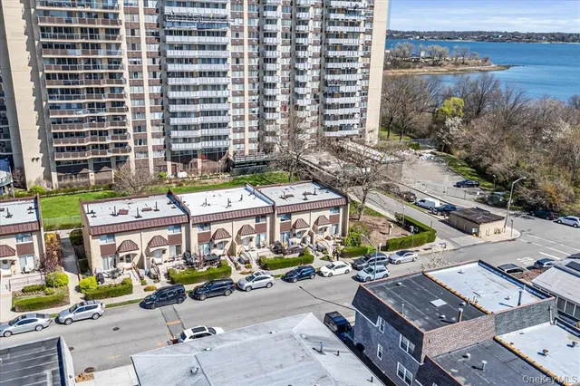 an aerial view of a city with tall buildings