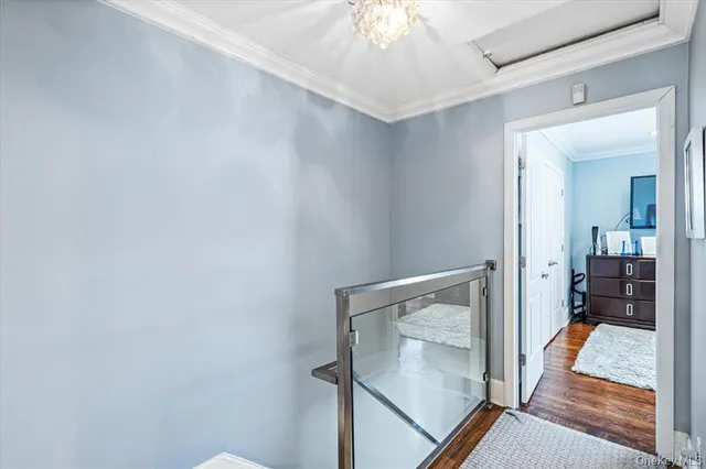 a bed room with a bed and a television