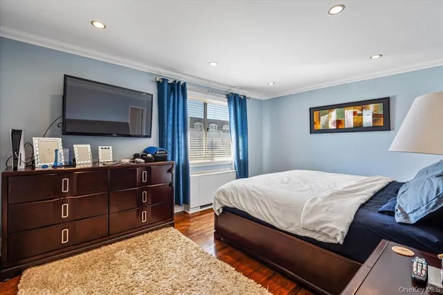 a bedroom with a bed and a table in it