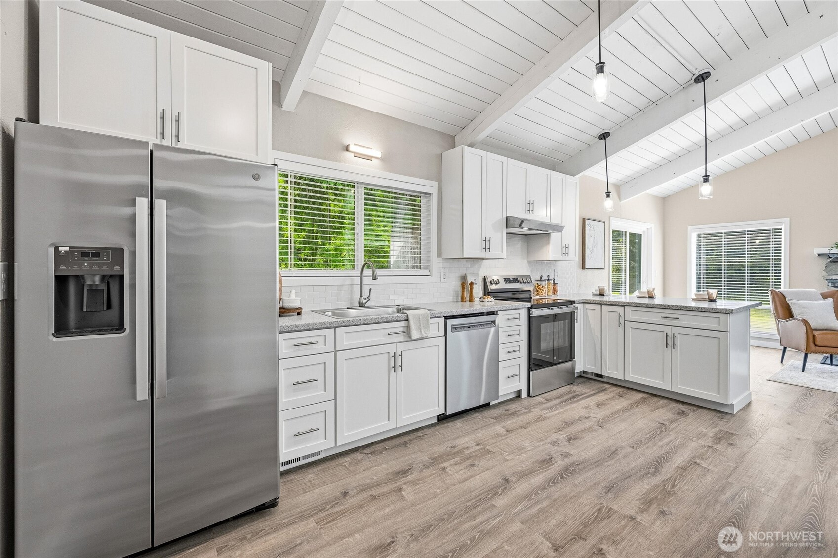 1535 Ten Mile Road Everson, WA 98247 - Photo 3 of 40 a kitchen with white cabinets and white appliances