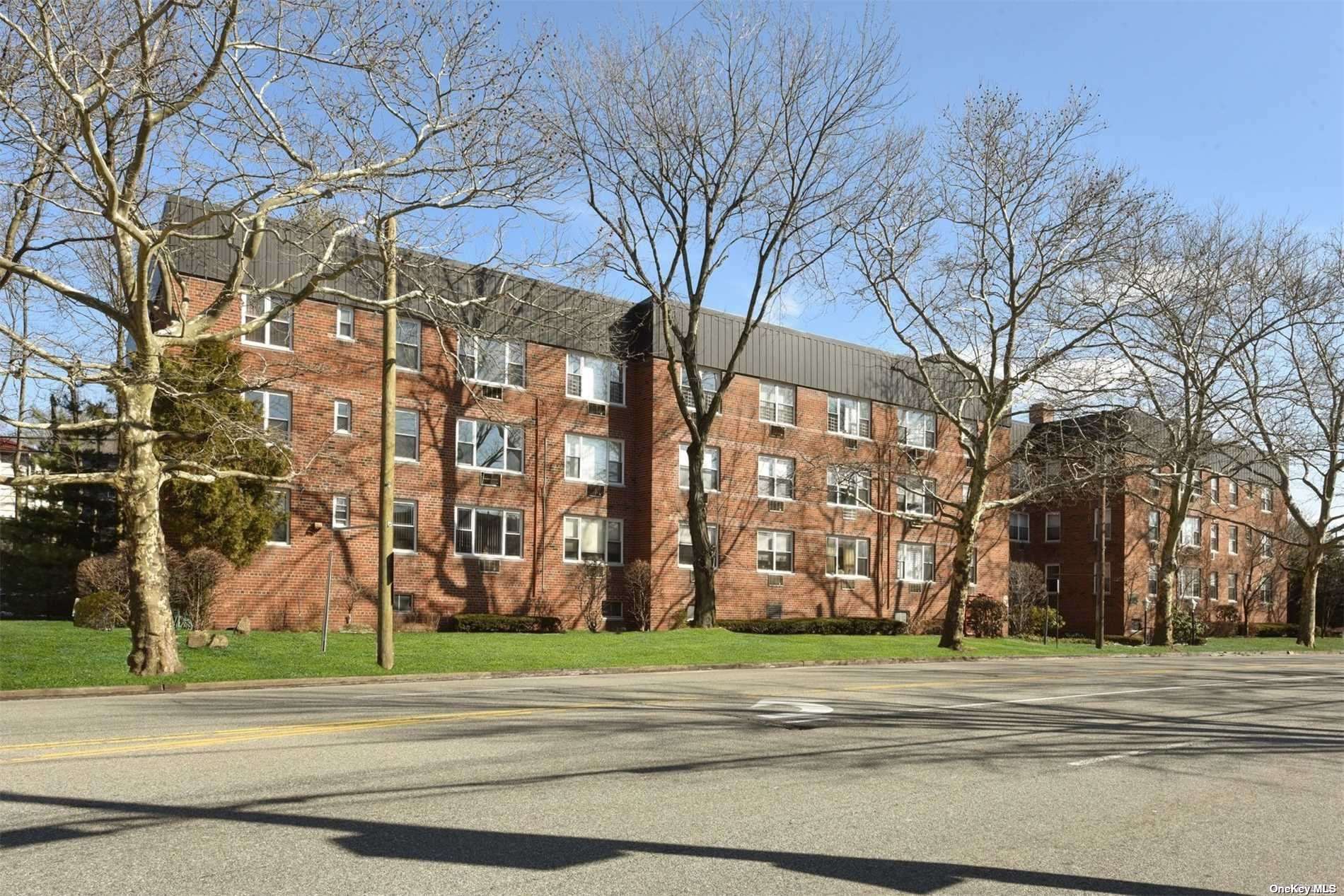 195 South Middle Neck Road, Unit 1G Great Neck, NY 11021 - Photo 1 of 1 a view of a multi story building