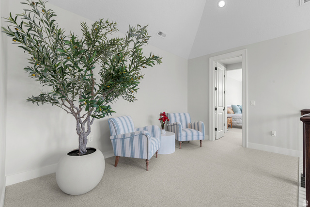 250 South Main Street, Unit 24 Alpine, UT 84004 - Photo 13 of 50 Living area with light carpet and vaulted ceiling