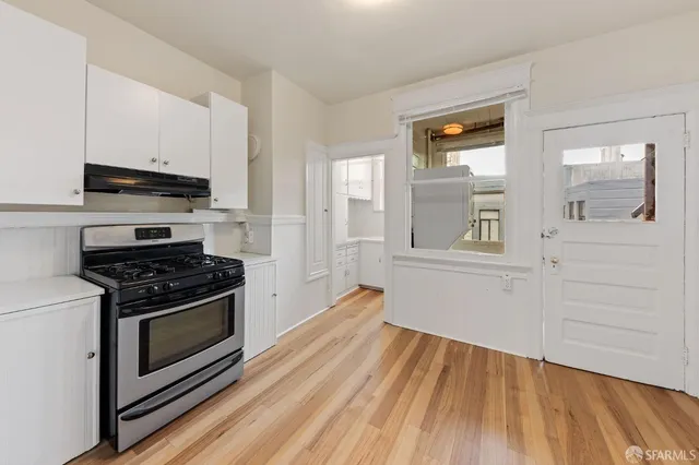 a view of a room that has a window in it