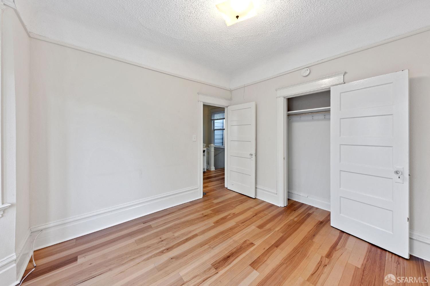 58-60 Valparaiso Street, Unit 2 San Francisco, CA 94133 - Photo 45 of 79 wooden floor in an empty room