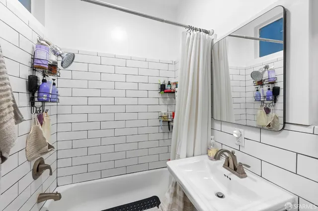 a kitchen with stainless steel appliances granite countertop a stove a sink and cabinets