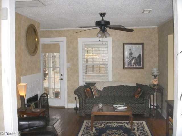 1951 Tillotson Road Pinnacle, NC 27043 - Photo 2 of 16 Living Room. You can enter the living room from the outside by the front door or the screen porch.