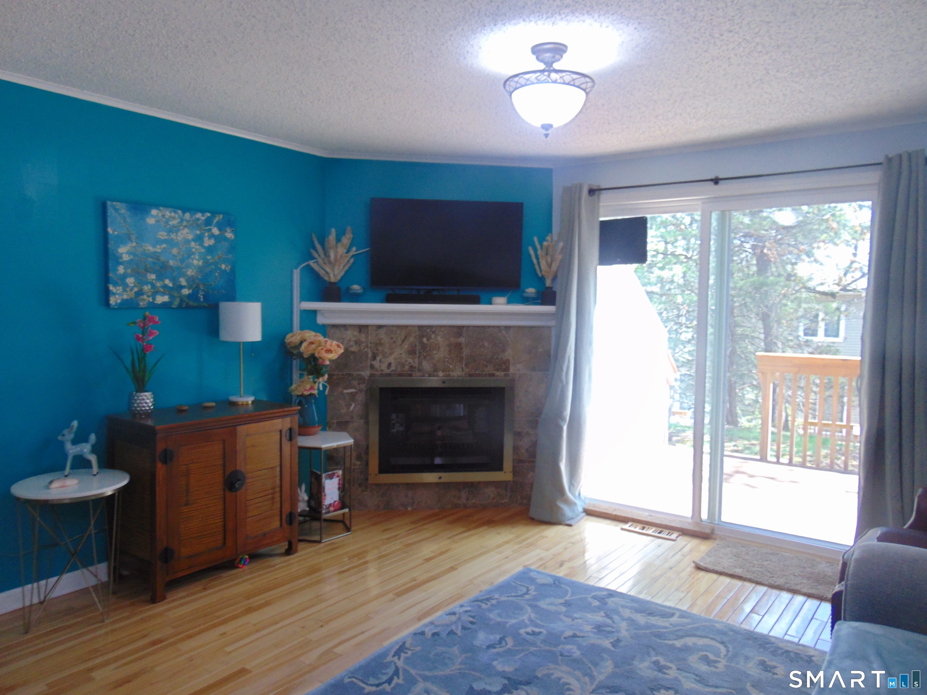 882 North Colony Road, Unit 31 Meriden, CT 06450 - Photo 8 of 34 a living room with furniture and a fireplace