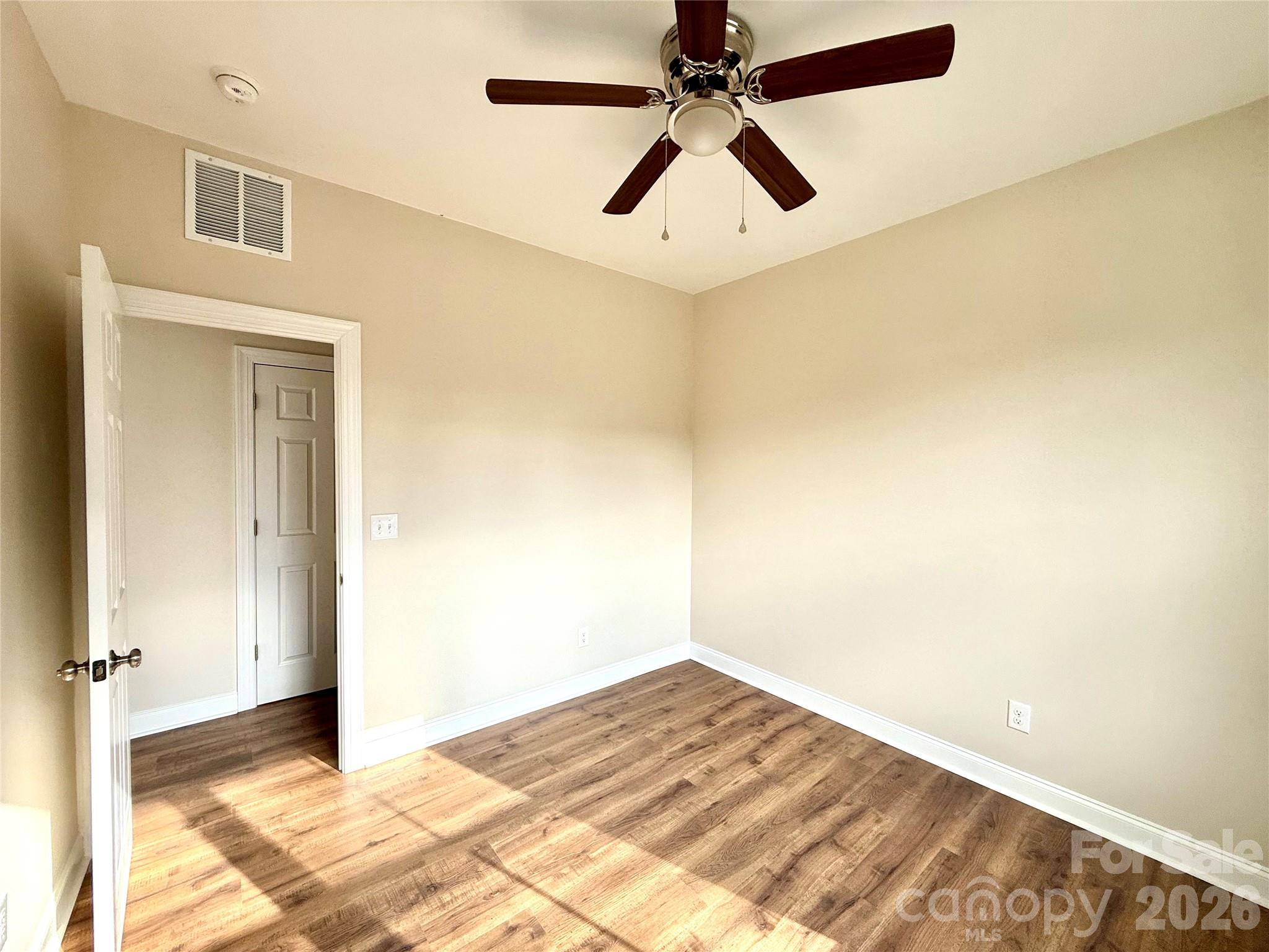 341 Broad Drive Southwest Concord, NC 28025 - Photo 15 of 16 a view of a room with a ceiling fan