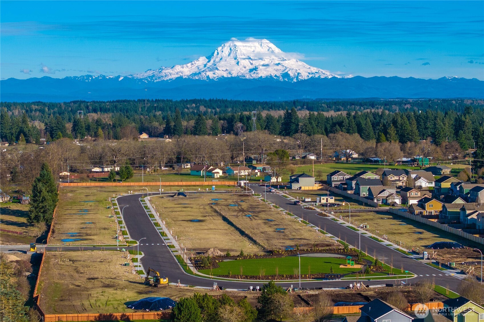 9816 Ferns Loop Southeast Yelm, WA 98597 - Photo 19 of 20 a view of a swimming pool with an outdoor seating