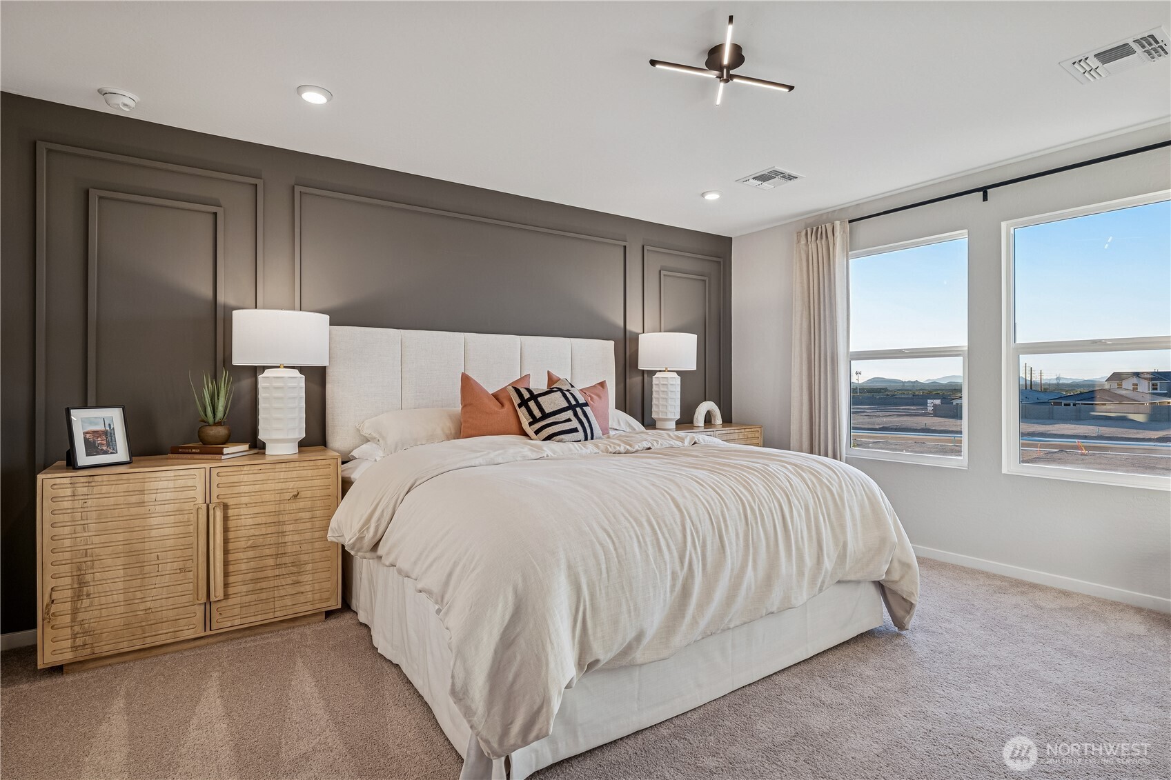 9816 Ferns Loop Southeast Yelm, WA 98597 - Photo 7 of 20 a bedroom with a bed and a large window