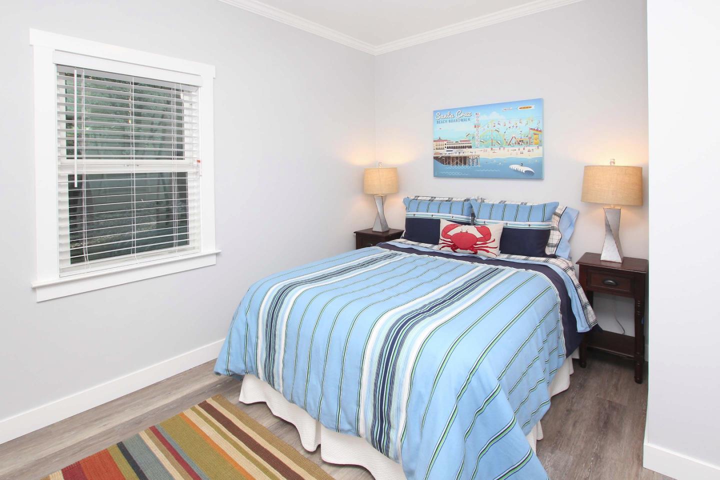 208 Cherry Avenue Capitola, CA 95010 - Photo 11 of 30 a bedroom with bed and a window