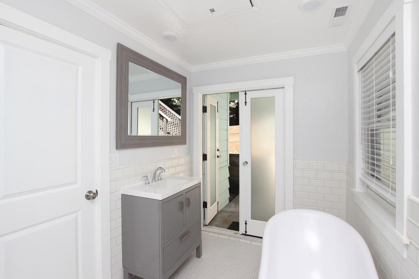 208 Cherry Avenue Capitola, CA 95010 - Photo 17 of 30 a bathroom with a sink and a mirror