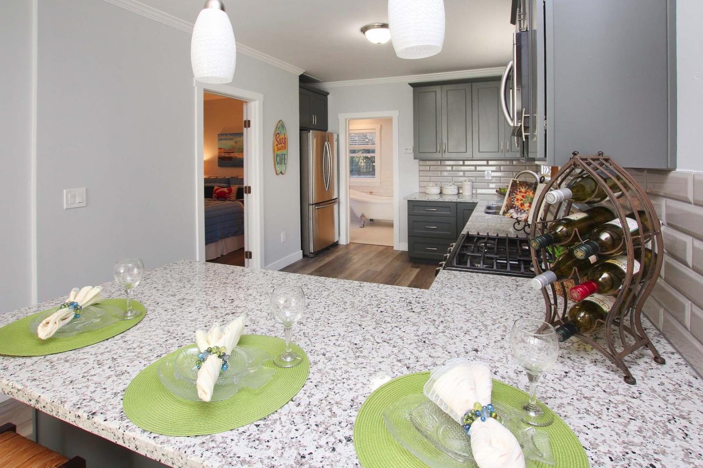 208 Cherry Avenue Capitola, CA 95010 - Photo 9 of 30 a living room with furniture and a wooden floor