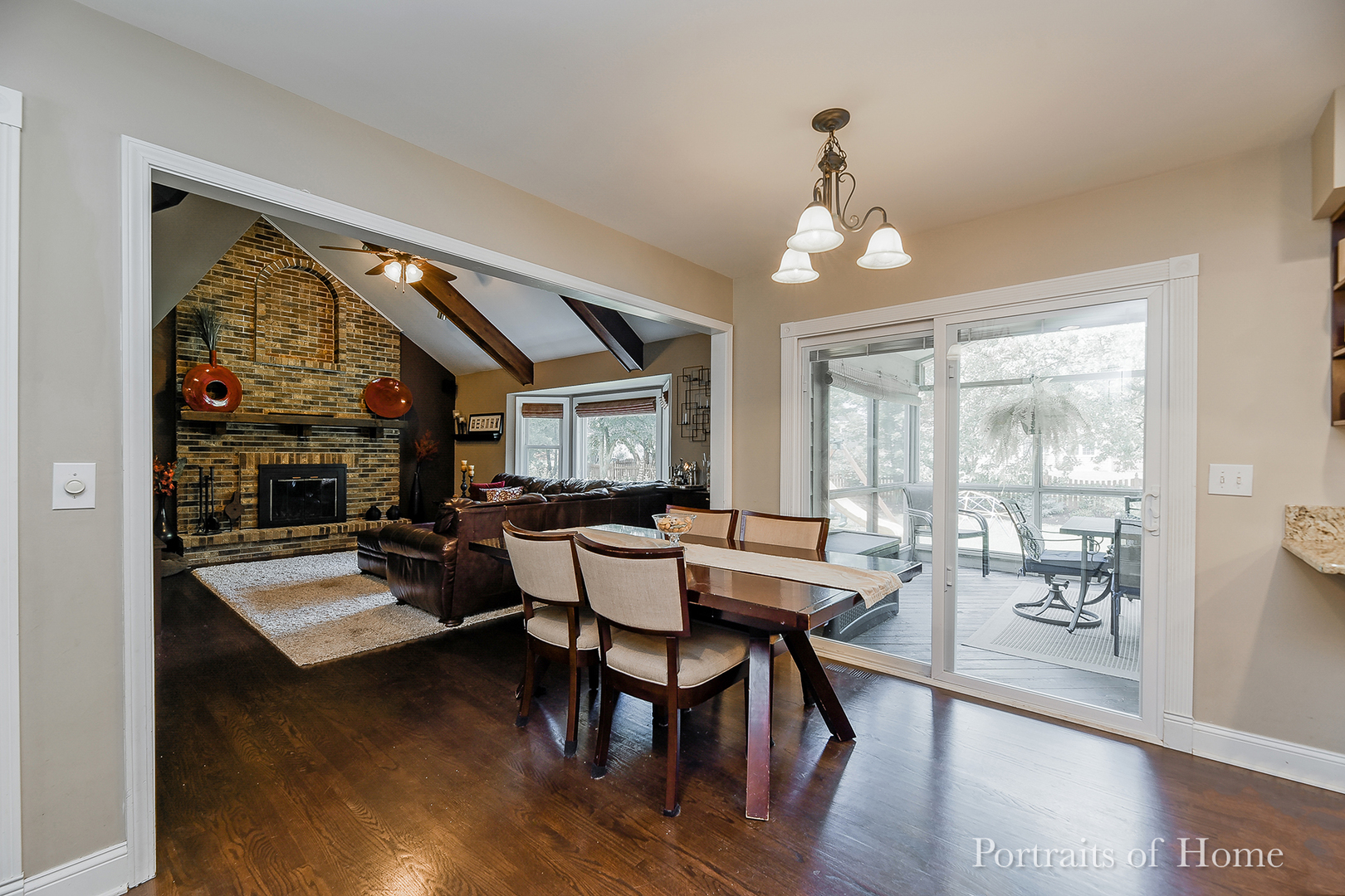 1803 Denison Road Naperville, IL 60565 - Photo 7 of 24 a view of a dining room with furniture window and wooden floor