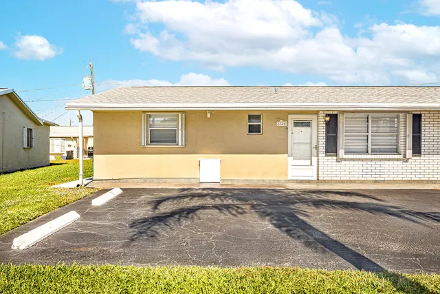 a view of a house with a swimming pool