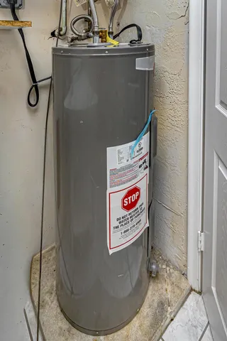 a view of a swimming pool with an outdoor seating