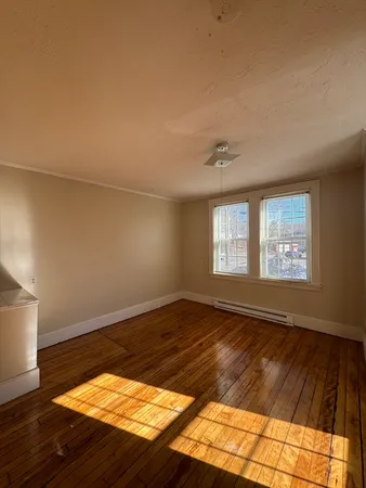 a view of storage and utility room with racks on the wall