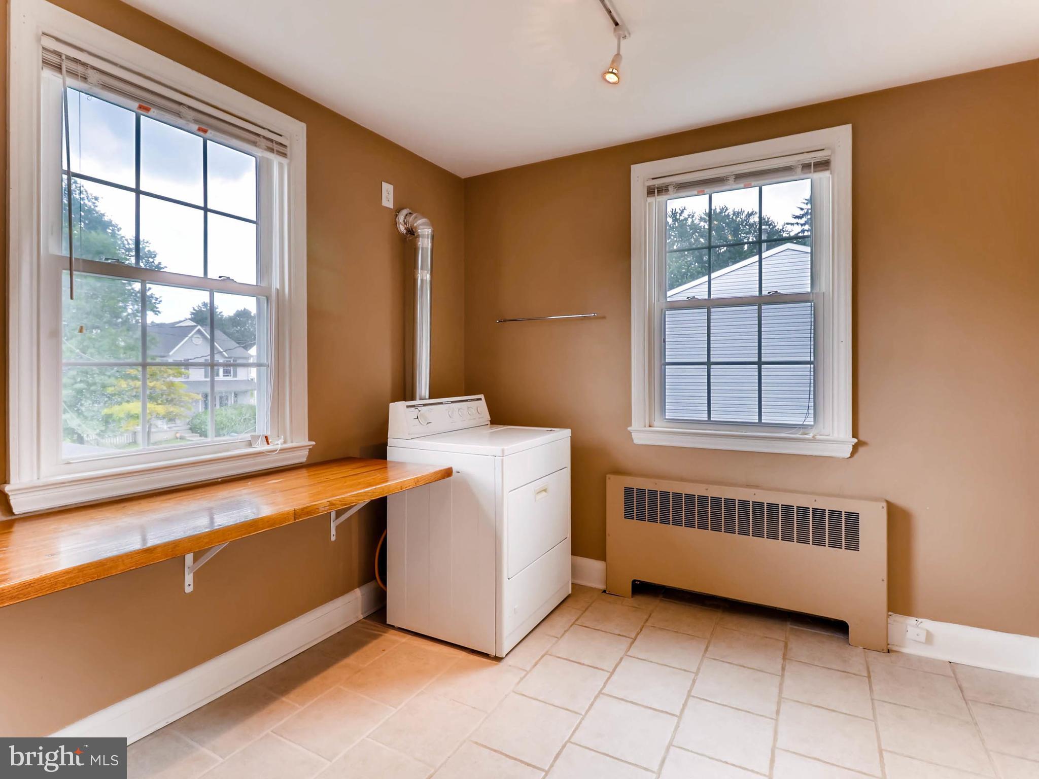 604 Coleraine Road Catonsville, MD 21229 - Photo 18 of 30 a view of a room with window and a kitchen