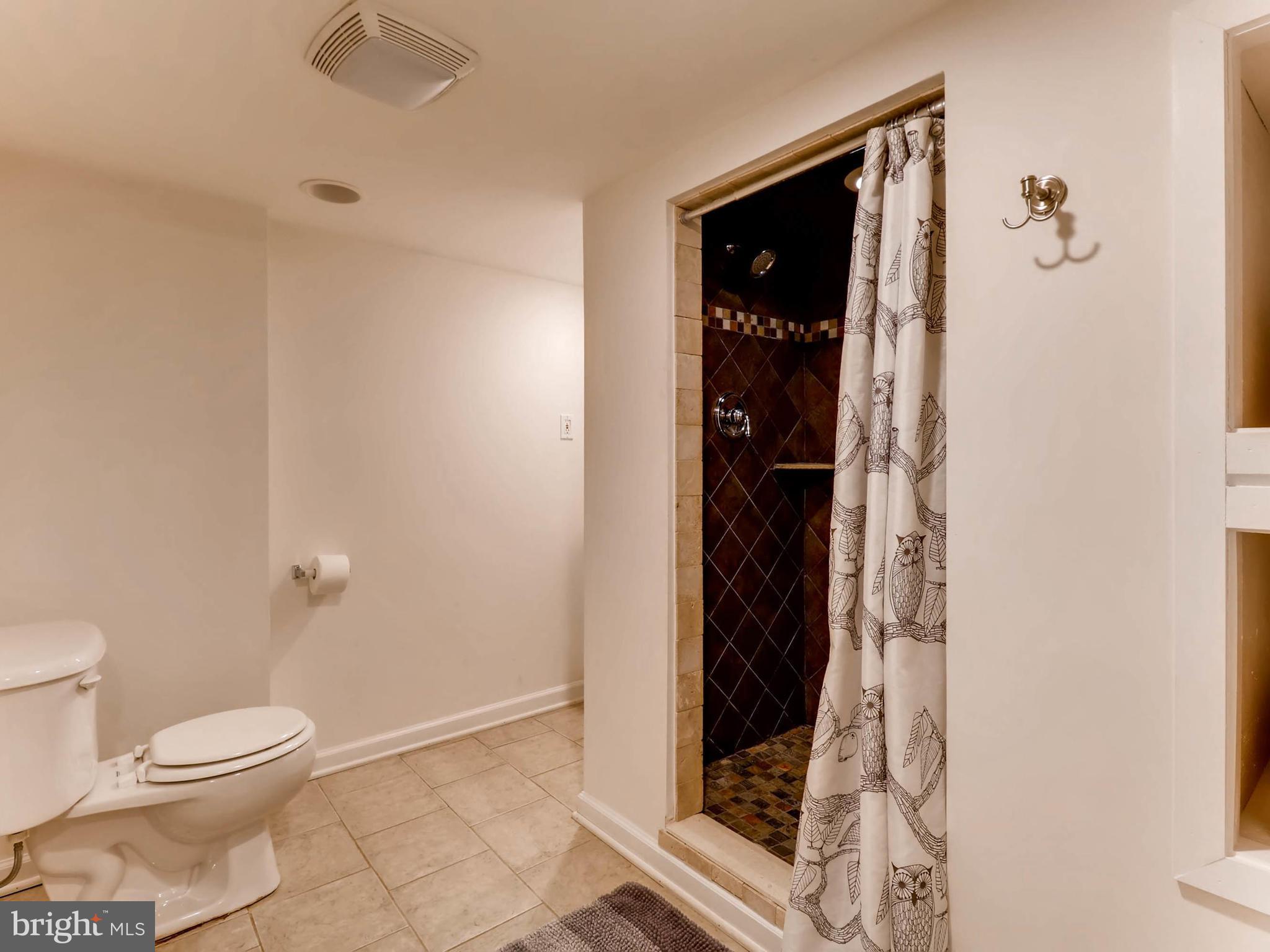 604 Coleraine Road Catonsville, MD 21229 - Photo 25 of 30 a bathroom with a toilet and a shower